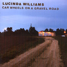 Williams Lucinda: Car wheels on a gravel road