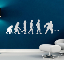 Muursticker evolutie mens ijshockey