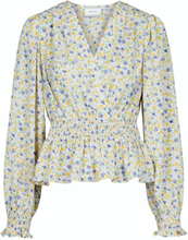 Amara frodig blomsterbluse