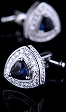 Manschettknappar "Crystal Blue" med en stor Blå och många små vita kristaller samt platinumplätering