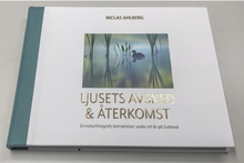 Ljusets avsked och återkomst : en naturfotografs betraktelser under ett år på Gotland (bok, halvfranskt)