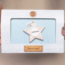 Schuifkaart met blauw stof, labels en houten ster