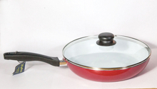 A frying pan with lid in a nice red design. 28 cm