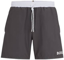 Contrast-logo swim shorts in recycled material