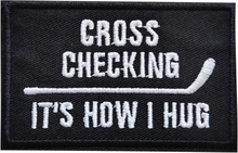 Tygmärke Cross Checking It's How I Hug