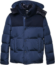 Down jacket in blue nylon fabric