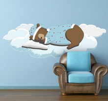 Sticker slapende beer op wolk