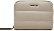 Liten damplånbok Calvin Klein Line Quilt Medium Zip Around K60K612201 Beige