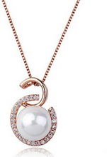 Halsband "Crystal Pearl" med Austrian Crystals och en Pärla i vitt eller bronsfärg samt i 18 K guldplätering