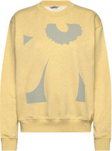 Leiot Unikko Placement Tops Sweatshirts & Hoodies Sweatshirts Yellow Marimekko
