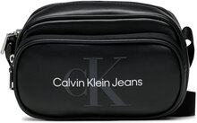 Axelremsväska Calvin Klein Jeans Monogram Soft Ew Camera Bag18 K50K510107 Svart