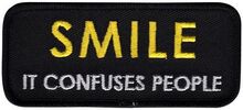 Tygmärke Smile It Confuses People