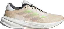 Adidas Adidas Women's Supernova Stride Move for the Planet Shoes Crystal Sand/Green Spark/Preloved Fig Løpesko 41 1/3