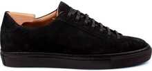 Skolyx premium sneakers i svart semsket skinn med svart såle