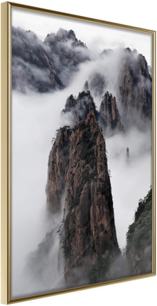Inramad Poster / Tavla - Clouds Pierced by Mountain Peaks - 30x45 Guldram