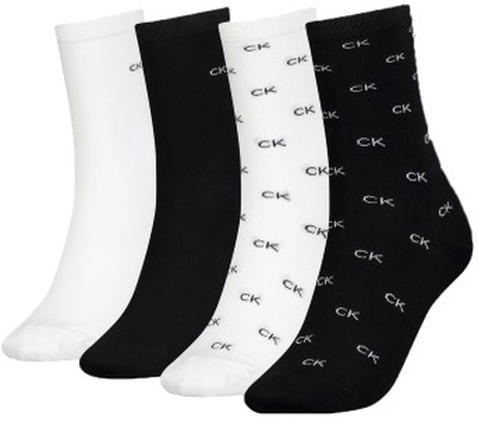 Calvin Klein Strømper 4P Holiday Pack Aop Socks Svart/Hvit One Size Dame