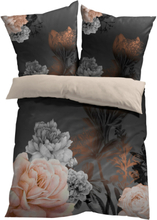 Vendbart sengesett med blomsterdesign
