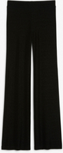 Flared glitter trousers - Black