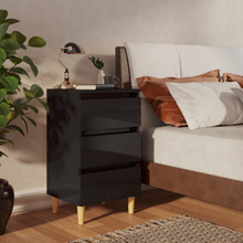 vidaXL Sängbord med ben i massivt trä svart högglans 40x35x69 cm