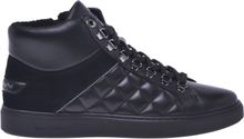 High-top trainers in black quilted leather
