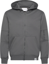 Woven Tab Zip Through Hoodie Tops Sweatshirts & Hoodies Hoodies Grey Calvin Klein Jeans