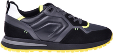 Low-top trainers in black leather and fluoresecent yellow fabric