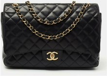Chanel Black Quilted Caviar Leather Maxi Clic Double Flap Bag