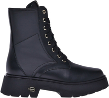 Combat boots in black calfskin