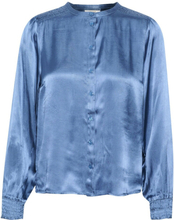 Lys på grunn av blå krem ​​crstarey bluse med lang erm og jævla - lys på grunn av blå topper