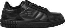 Low-top trainers in black leather and split leather